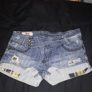 Distressed denim shorts